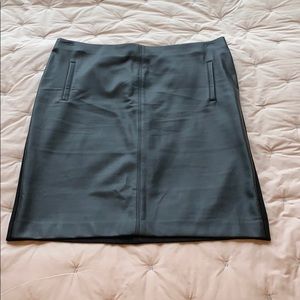 Black feaux leather/ nylon Chico’s skirt.